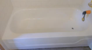 chipped procelain bathtub after refinishing