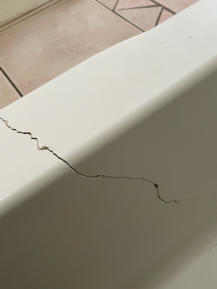 fiberglass shower base crack